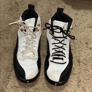 Jump White and Black Sneakers with Gold Accents